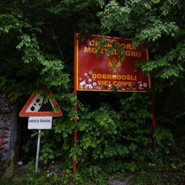 sign indicating a climb of the trans balkan race