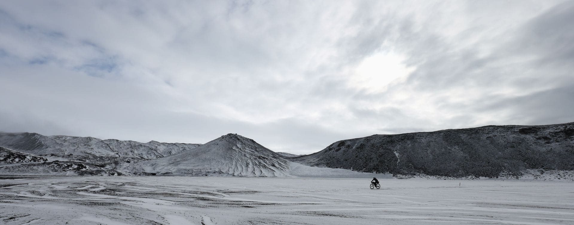 cyclist in winter landscape