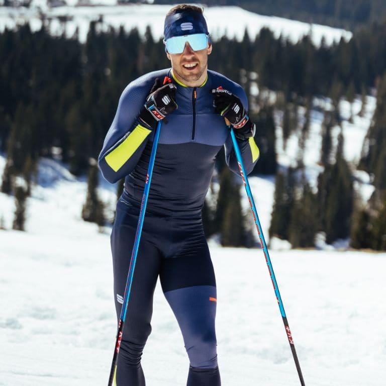 Federico Pellegrino cross-country skiing in a snowy landscape